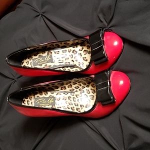 Pinup Couture size 7 red patent leather with black bow shoes